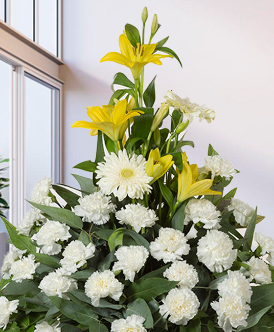 enviar centro funerario blanco y amarillo para tanatorio de Leganés